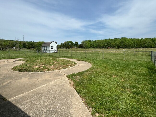 Building Photo - Available July 2025! 4-Bedroom, 2-Bathroom...