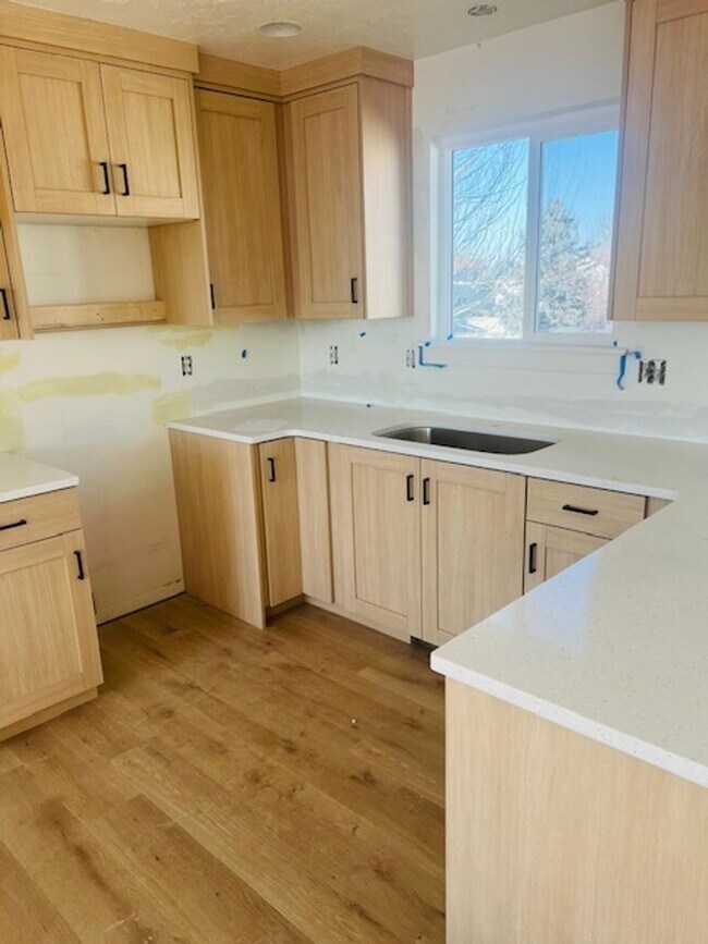 Building Photo - Beautiful remodeled home with fenced backyard and 2 car garage