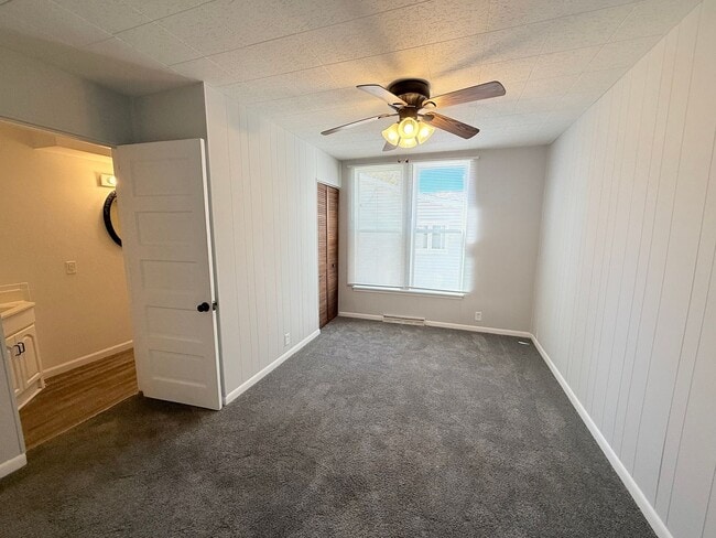 Building Photo - Spacious 4-Bedroom Home with Fenced Backyard