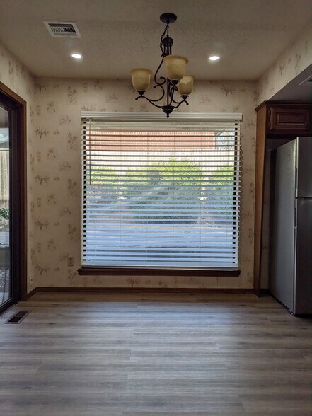 Dining Area with new Light fixtures, lots of natural light. - 1616 Julie Plz