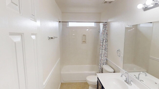 Building Photo - Expansive Living and Stylish Updates in So...
