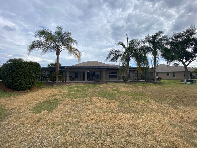 Building Photo - SEASONAL RENTAL. Large 4 Bed + 4 1/2 Baths Home, w/Views of the Jacaranda Golf Course and Lake in...