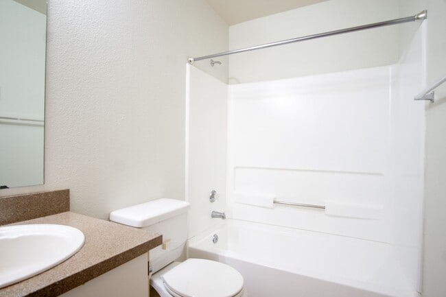 Building Photo - Major Updates: Vaulted Ceiling Spacious 2-Bed 2-Bath w DW, WD, Balcony!