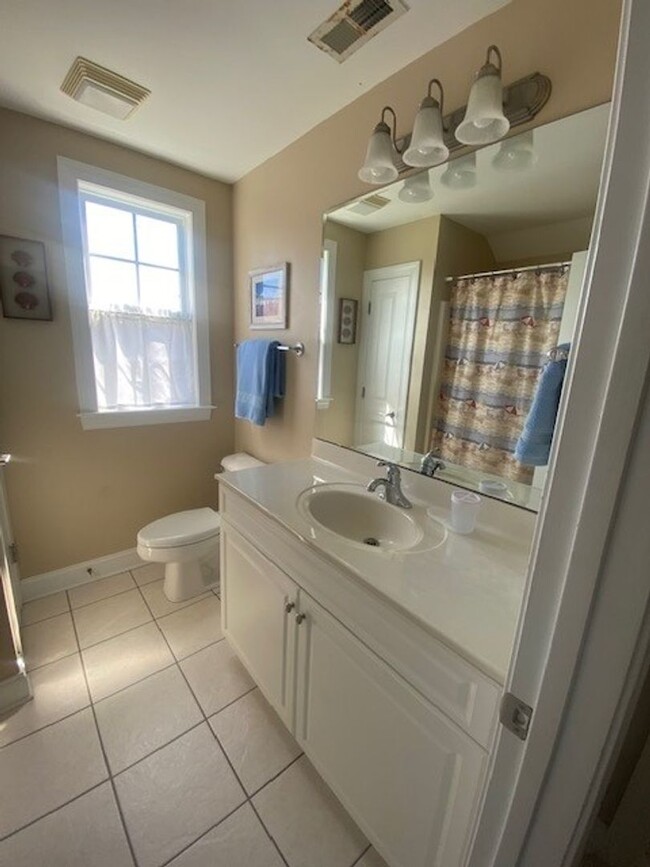 Building Photo - Nicely furnished garage apartment in gated...