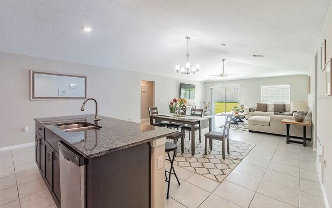 Building Photo - "Discover Spacious Comfort: 4-Bed, 2-Bath Gem in Riverview!"