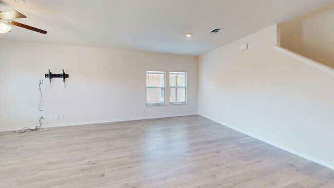 Building Photo - This spacious 2,683 sq. ft. two-story home features 4 bedrooms and 2 bathrooms, offering a well-d...