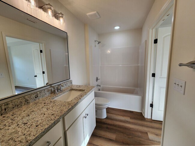 Building Photo - !!New Construction!! NEAR Pinegrove Elementary/Middle - 4BR Home with Granite Countertops, LVP Fl...