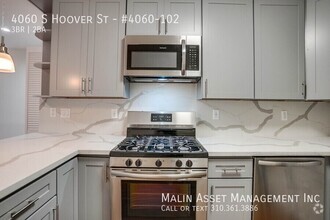 Building Photo - 4040-4060 S Hoover St