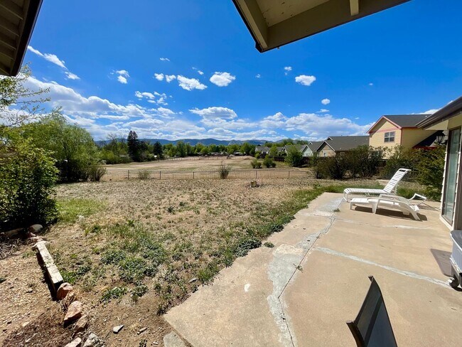 Building Photo - Expansive 5-bedroom, 2.5-bath home with incredible mountain views!