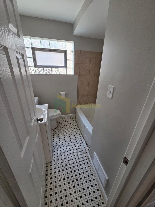 Building Photo - Beautifully Renovated 4-Bedroom Home with Finished Basement & Fenced Yard