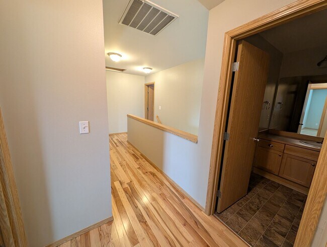 Building Photo - A Gardeners Oasis! 3 Bedroom Townhome for ...
