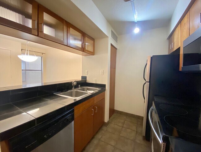 Building Photo - Beautiful Two-Bedroom Condo at The Reserve