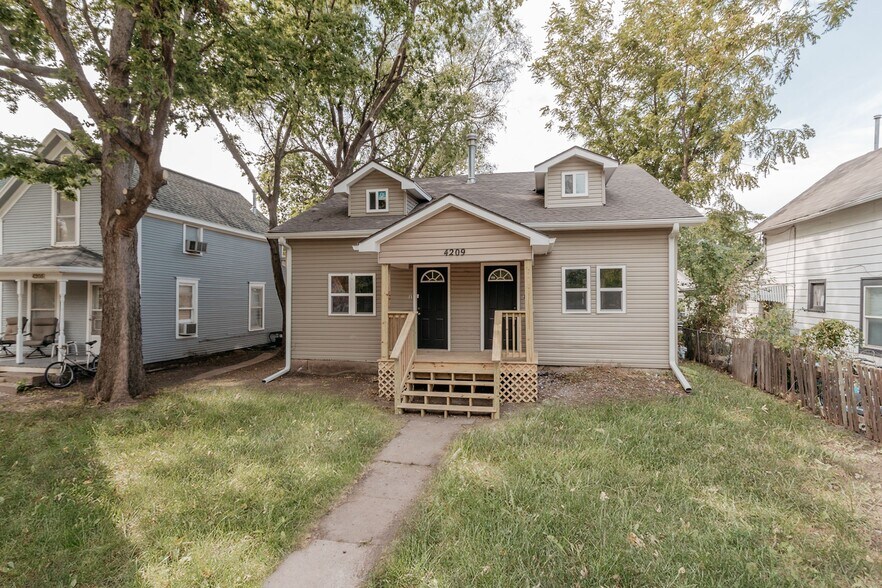 Building Photo - 4209 Touzalin Ave