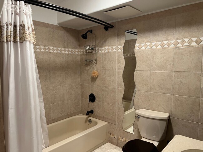 Full bathroom with bathtub - 1627 15th Ave