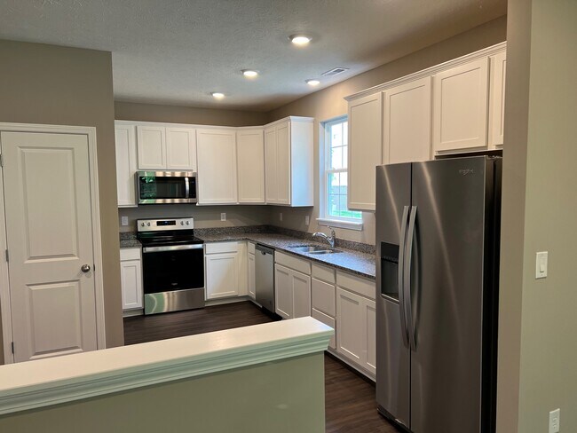Building Photo - 5644 Brownstone Dr