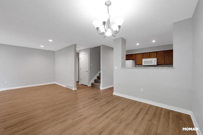 Building Photo - Spacious 2 Story Townhome + finished basem...