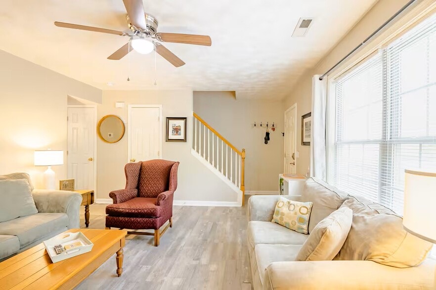 Living room off front entryway. LVP flooring. - 515 School Ln