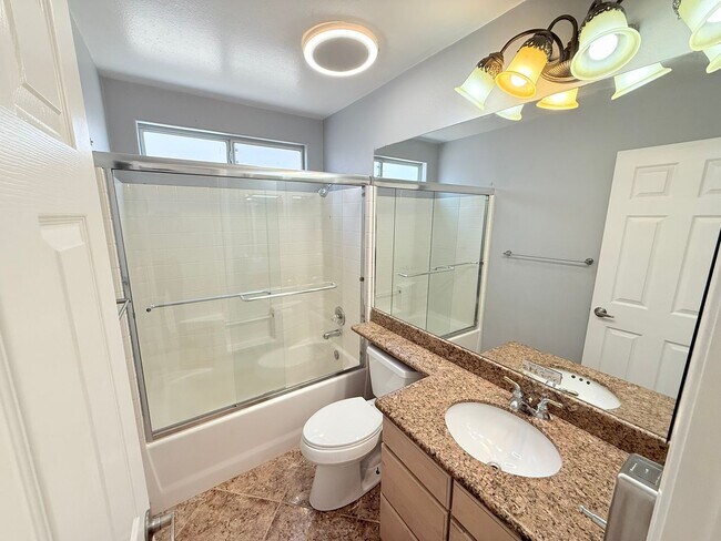 Building Photo - Spacious 4-Bedroom Home with Pool & Spa in...