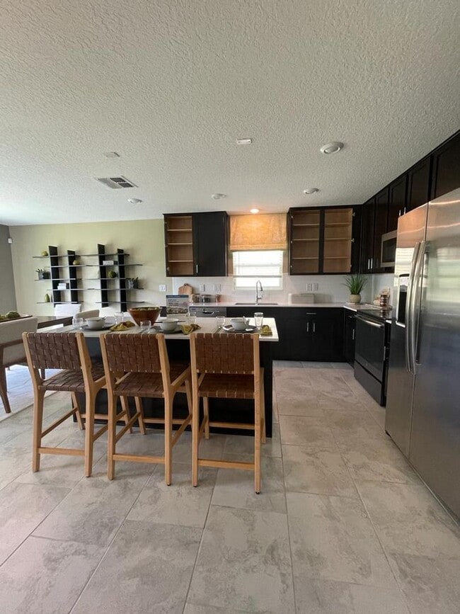 Building Photo - BEAUTIFUL BRAND NEW 2022 Home in the new S...