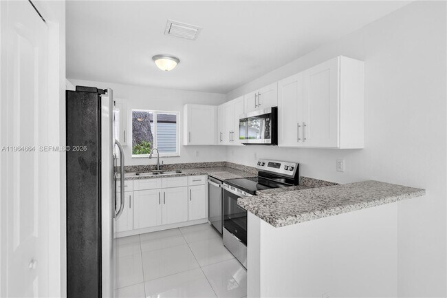 Building Photo - 3175 NW 43rd St