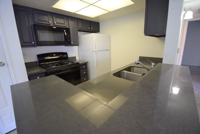 Building Photo - Atrium Apartments