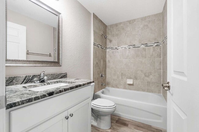 Building Photo - 3BR, 2BA Available Now with Fenced Yard and New Floors, North Marion Oaks