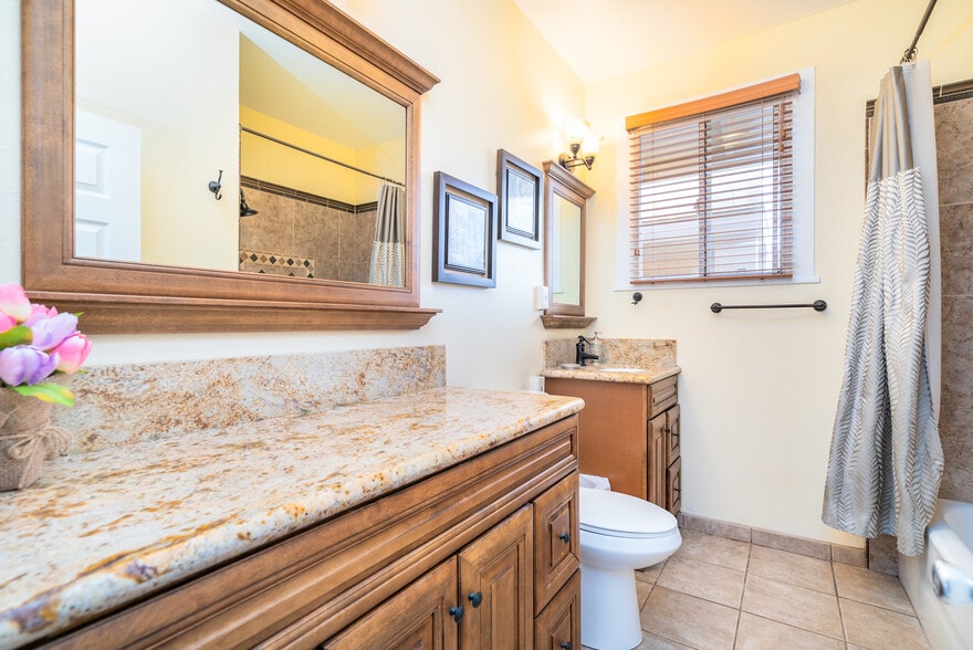 1 of 3 bathrooms. This one features dual vanities and extra large countertop space. - 408 N Kainalu Dr