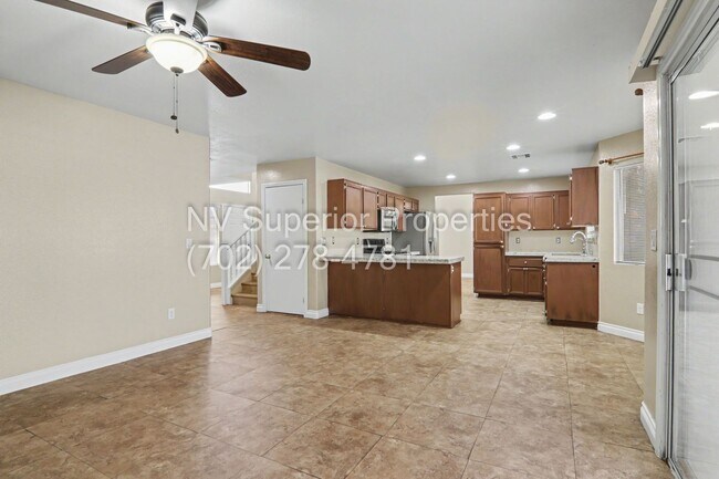 Building Photo - NW!! 4 bedrooms!! Bed & Bath DownStairs!!! RV Parking!!! Synthetic Grass Front yard!! Real Grass ...