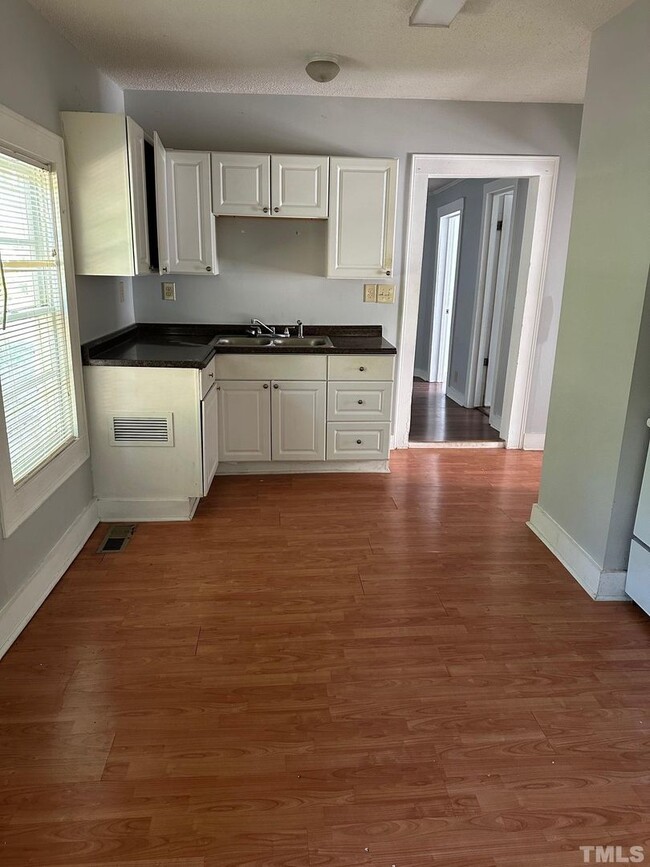 Building Photo - Your Own Home and Yard Centrally Located 3...