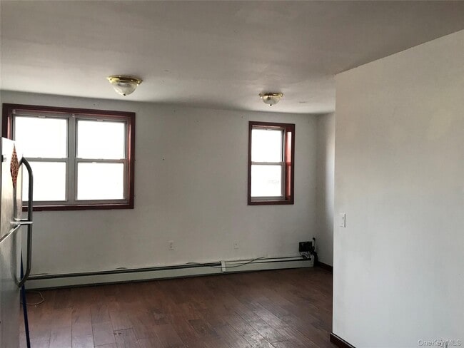 Building Photo - 57-30 Main St