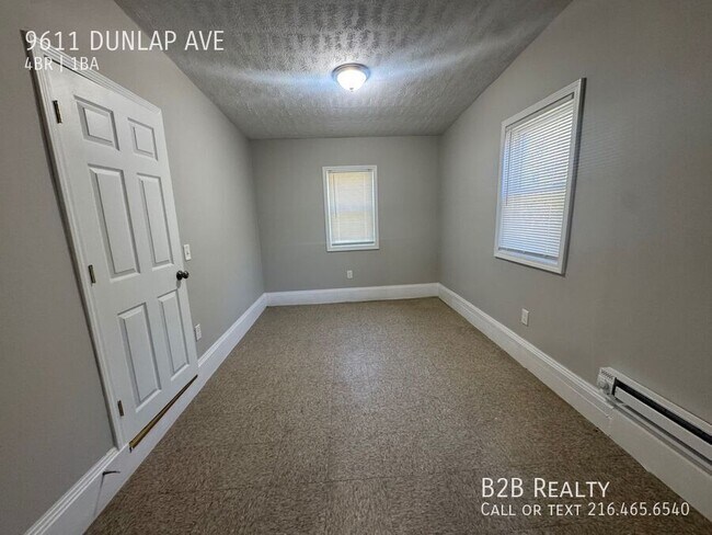 Building Photo - 9611 Dunlap Ave