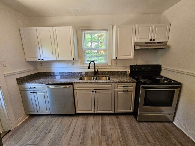 Building Photo - First Offering - 4BR/2BA Brick Cape Cod - ...