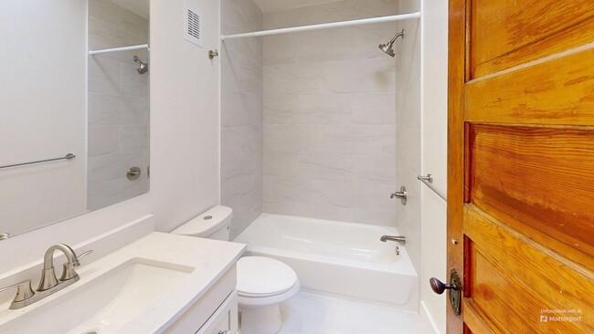 Building Photo - 1005-1017 W. 14th Ave.