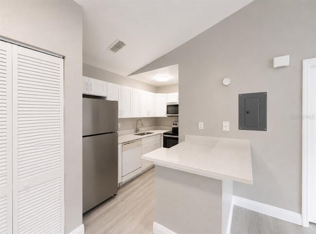 Building Photo - 9160 Lake Chase Island Way