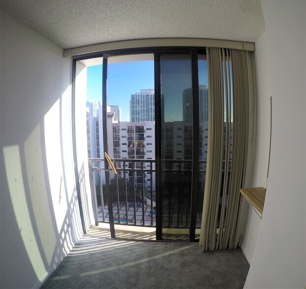 Balcony facing the pool - 17011 N Bay Rd