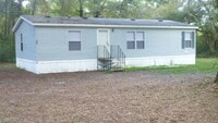 Building Photo - Updated Mobile Home with Large Yard