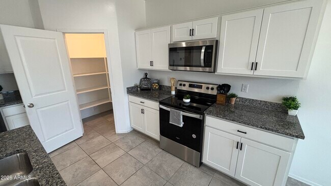 Building Photo - 1136 W Sand Cyn Ct