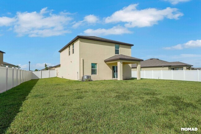 Building Photo - Spacious 5BR House in Fort Pierce, minutes...