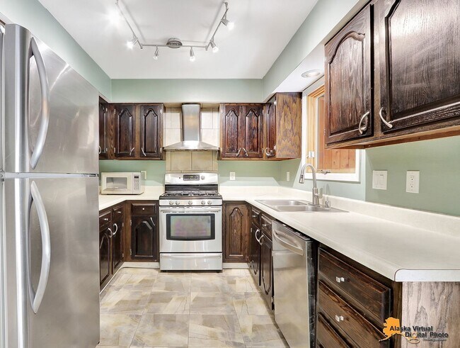 Building Photo - Eagle River Home w/ Fenced Yard, Sunroom, and Garage!