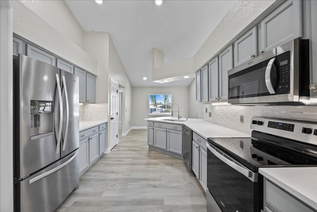 Building Photo - Beautifully remodeled home is situated in ...