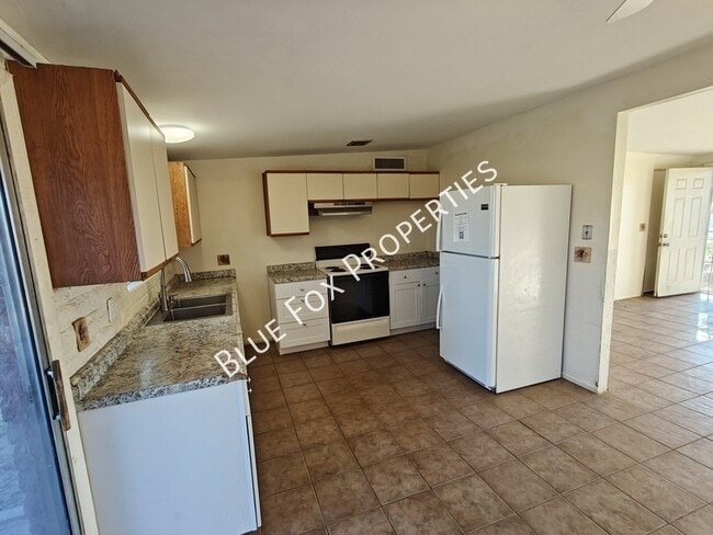 Building Photo - 3755 S Amos Pl