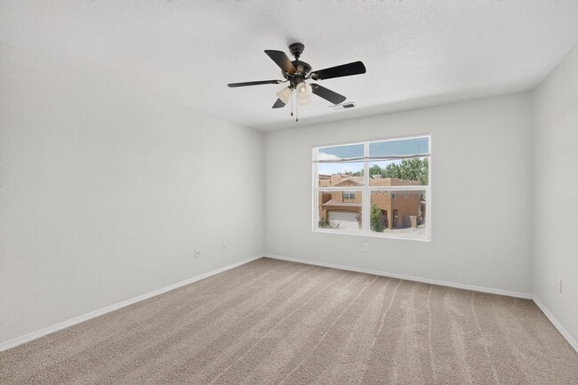 Building Photo - 6512 Los Pueblos Pl NW