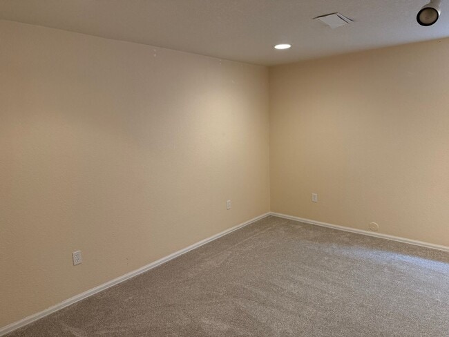 Building Photo - Spacious 4-Bedroom Ranch with Finished Bas...