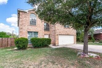 Building Photo - Welcome home to this spacious 4-bedroom, 2...