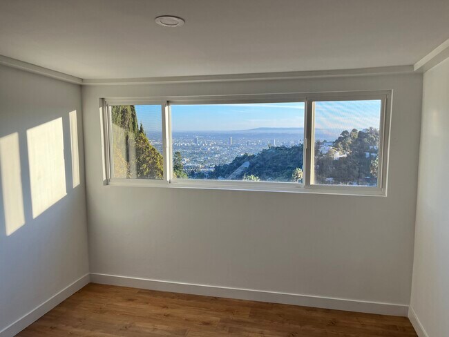 Living room window and view - 7934 Zeus Dr