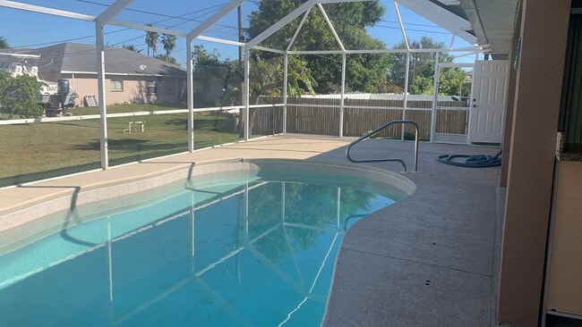 Building Photo - Dive Into Comfort – Home with Pool , Speci...
