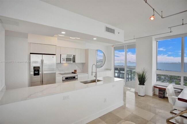 Building Photo - 6365 Collins Ave