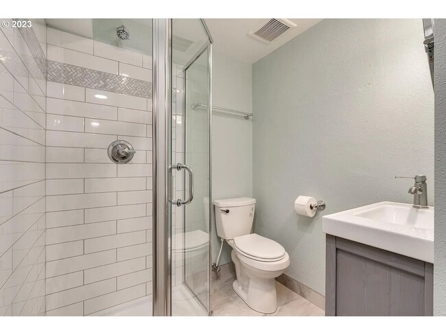 Building Photo - Stylishly Updated Mid-Century Gem on a Qui...