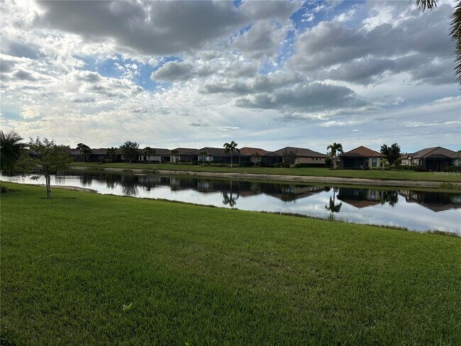 Building Photo - 8725 Amaretto Ave