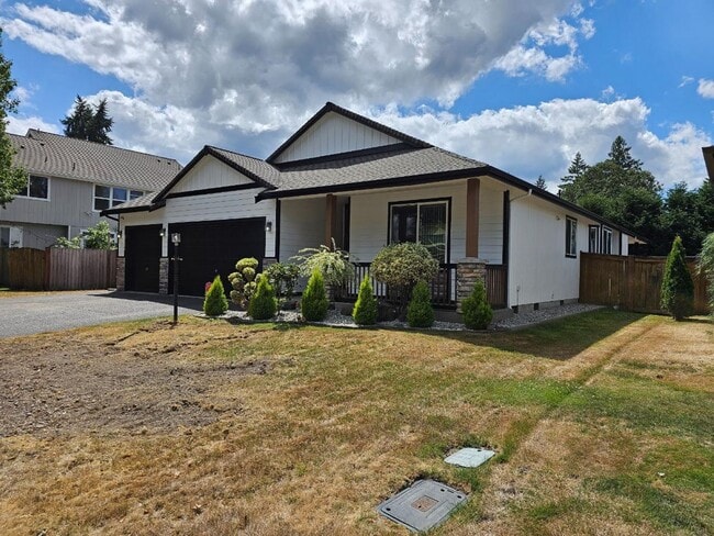 Building Photo - Spacious Tacoma Home with Gas Fireplace, 3-Car Garage & Covered Patio!